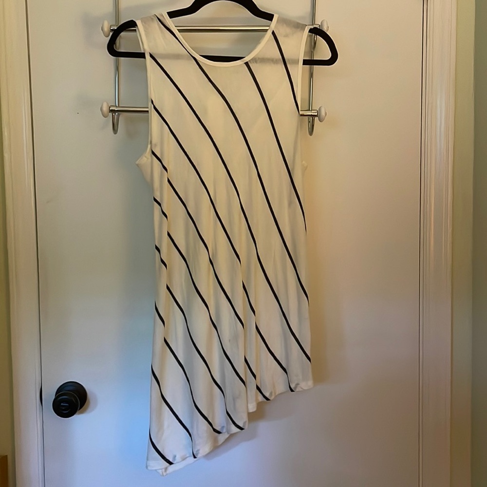 Black and white diagonal stripe sleeveless asymmetrical tunic top